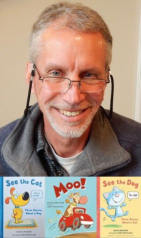Picture of author David LaRochelle with some of his books